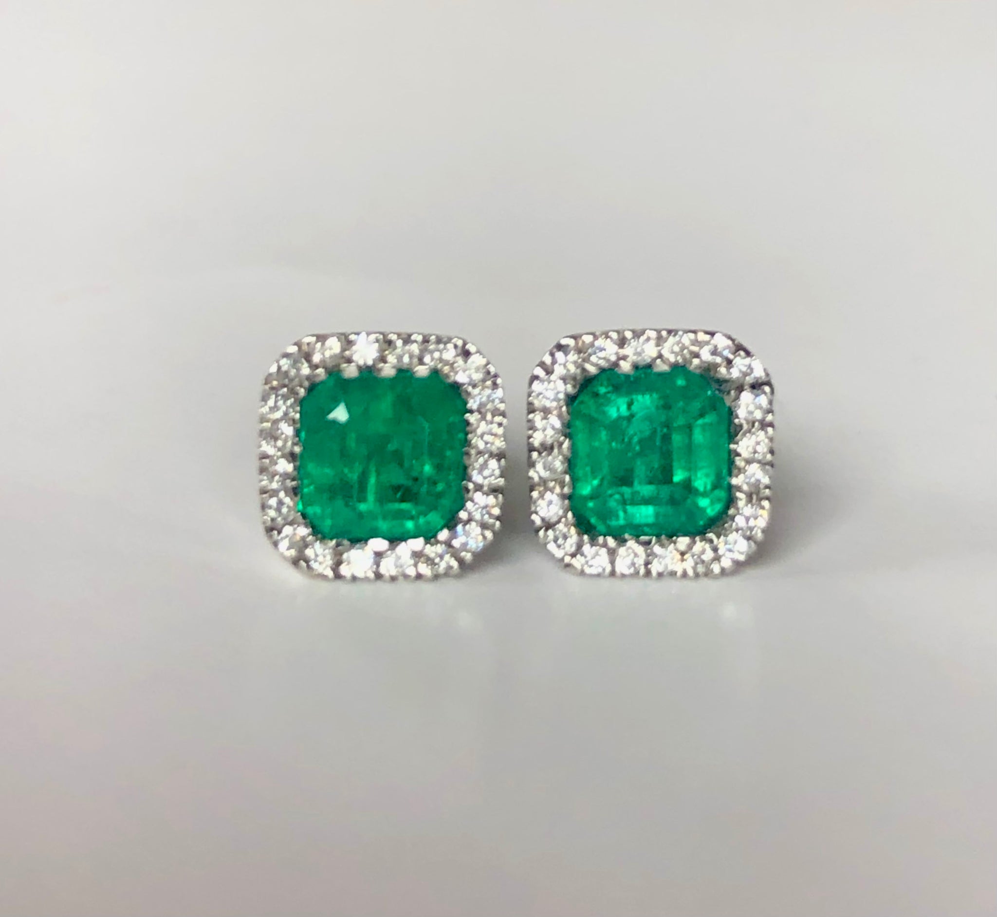 AAA Emerald Cut Colombian Emerald with Diamond Halo Stud Earrings